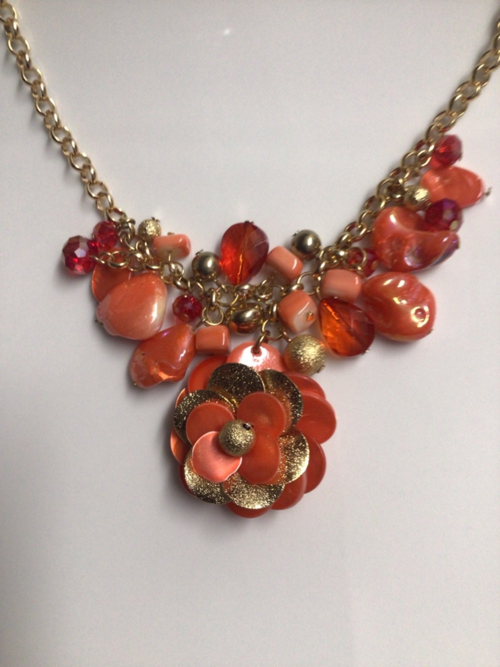 Vintage Statement Necklace with Coral Flower and Bead Charms. Gold tone chain.